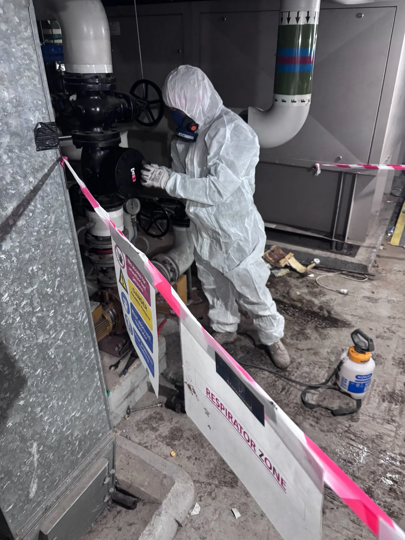 Asbestos artex removal from concrete soffit in Battersea