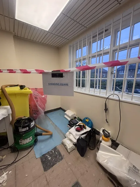 Asbestos floor tile and bitumen removal in Battersea
